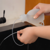 Dispositif d’Aide à la Lactation avec Réservoir
